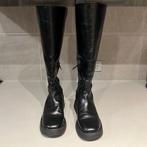 Black knee high boot